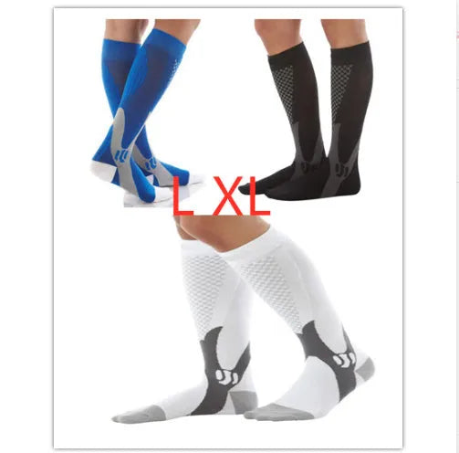 Graduated compression socks for men and women in black, shown laid flat.