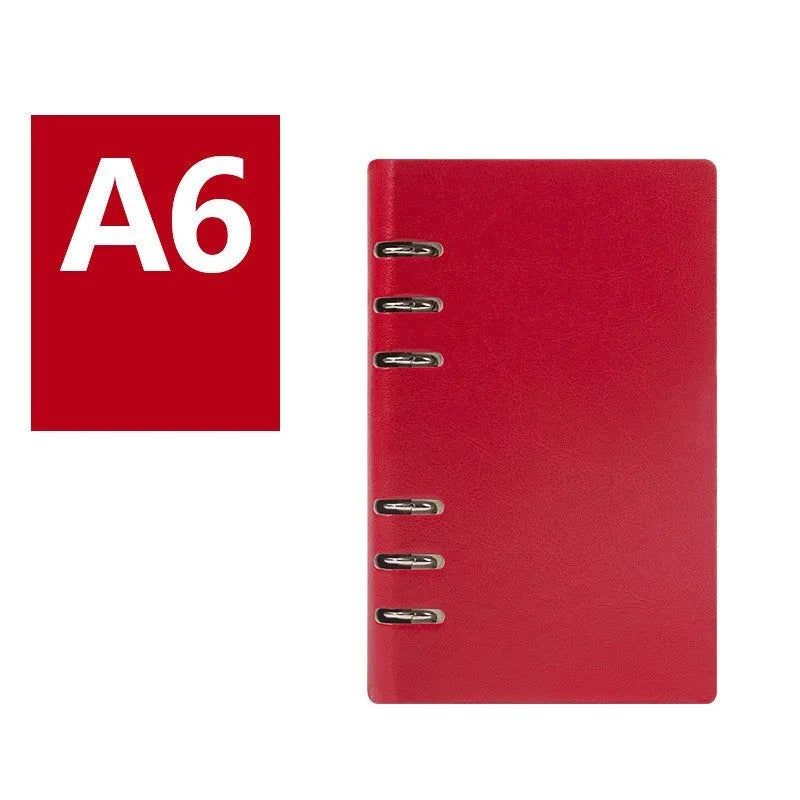 Loose-leaf business notebook with imitation leather cover in multiple colours, open to show beige paper.