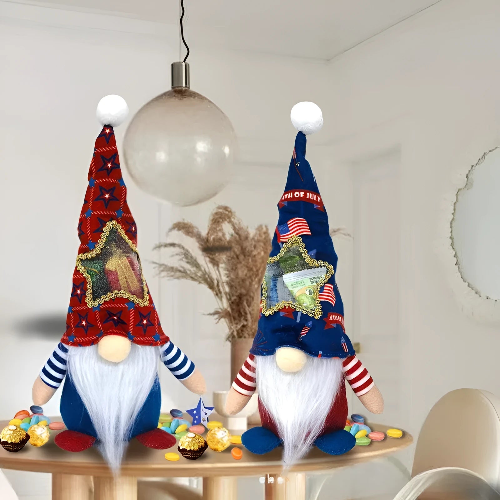 Two faceless Rudolf baby doll cloth Christmas ornaments in red and white suit style.