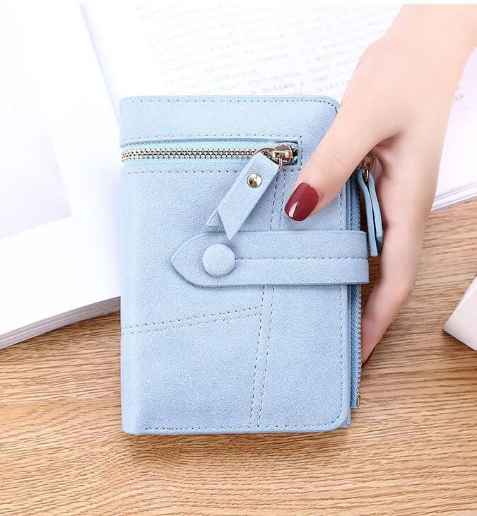 Faux leather standard short wallet with zipper closure, solid colour, showing multiple internal compartments