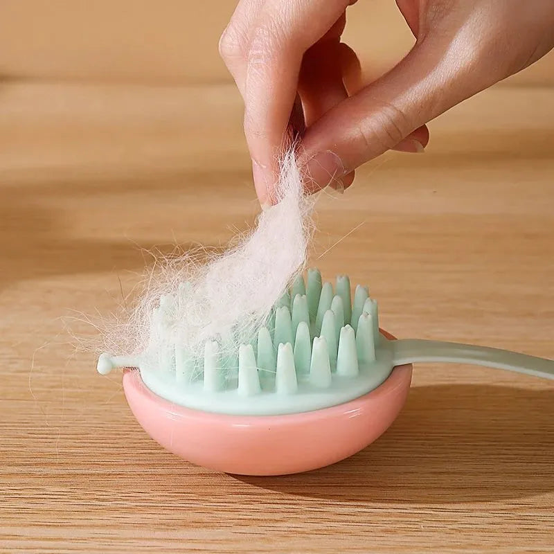 Pet silicone bathing brush for cats and dogs, available in blue, pink, white, and yellow