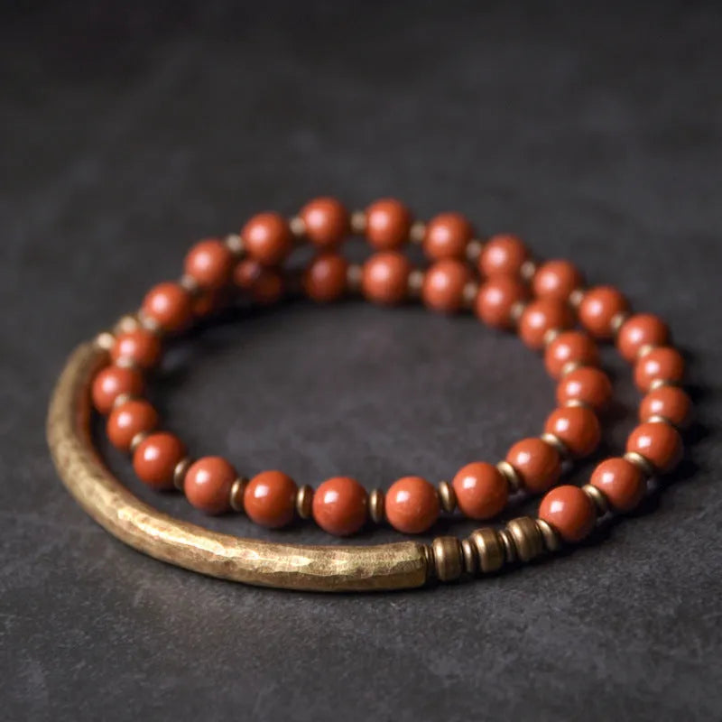 Layered retro ethnic bracelet for men and women with natural stones and brass details in adjustable sizes.