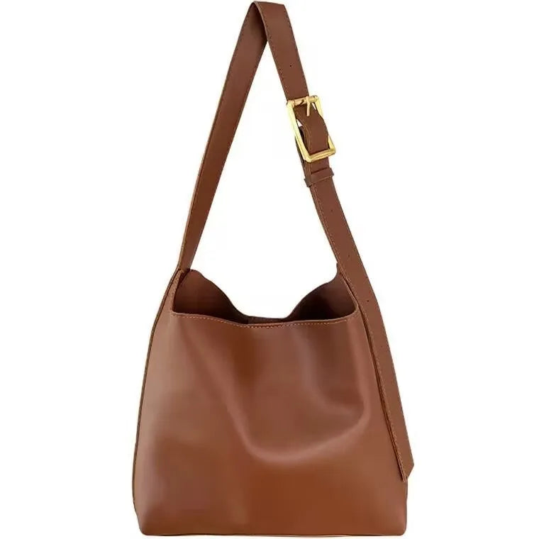 Women's black and brown shoulder bags with swinging threads and soft PU leather construction