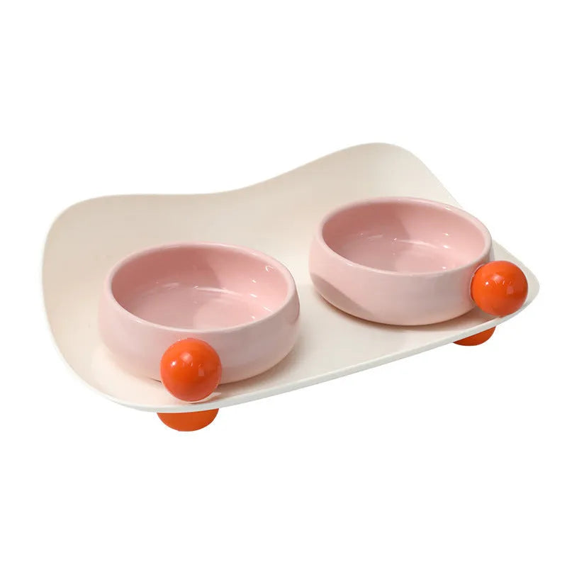 Pink double elevated ceramic pet bowl with non-slip base for cats and small dogs