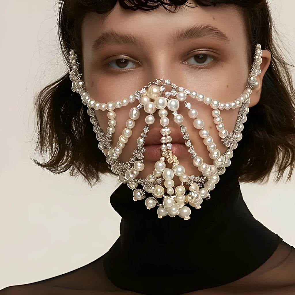 Geometric rhinestone mask with electroplated alloy and artificial gemstones in silver finish