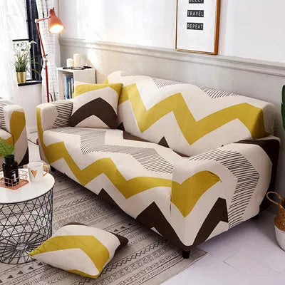 Geometric patterned stretch sofa slipcover fitted on a modern two-seater sofa.
