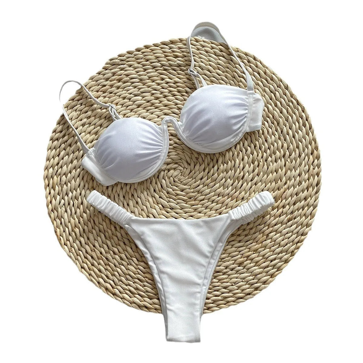 Women's black underwire bikini set with briefs style on a mannequin.