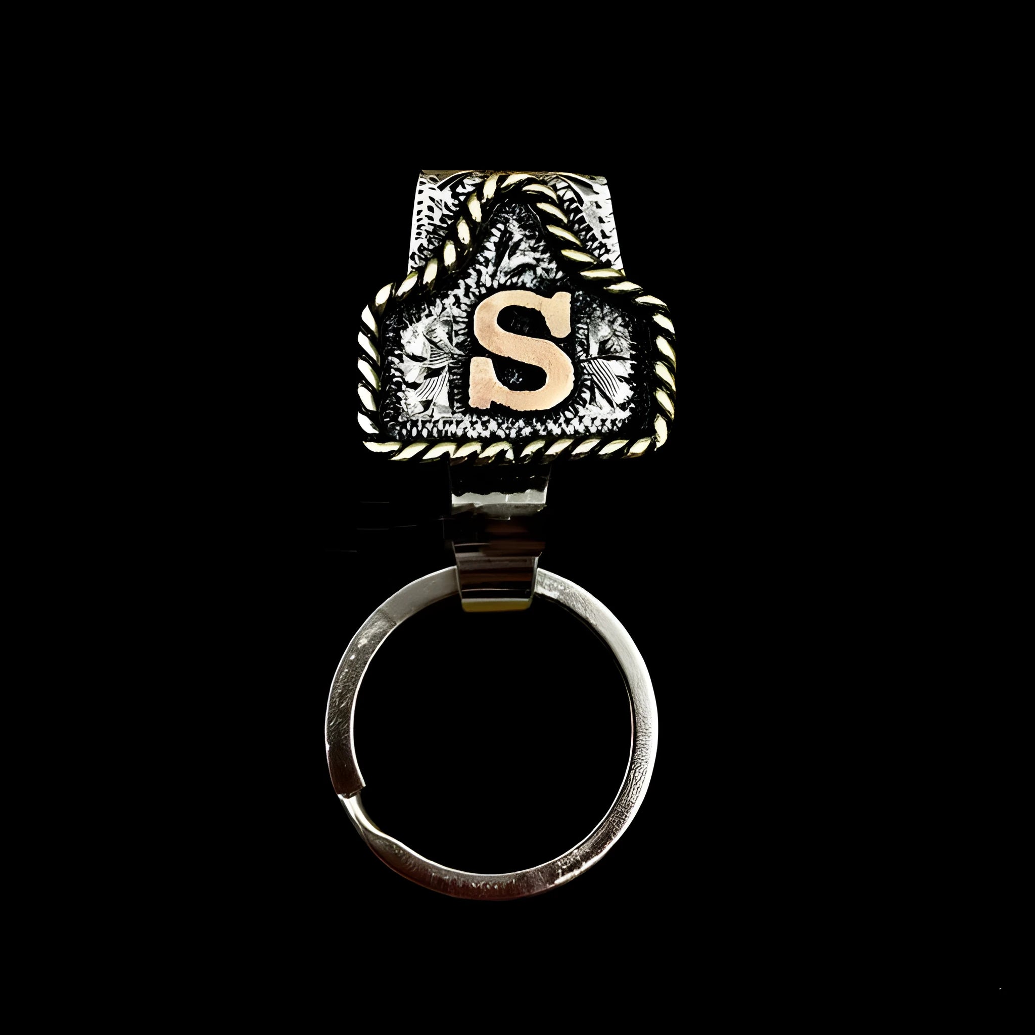 Handmade stainless steel cow tag belt key holder with engraved number plate on a split ring.
