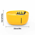 Yellow automatic cat water fountain with filter and USB cable on anti-slip base.