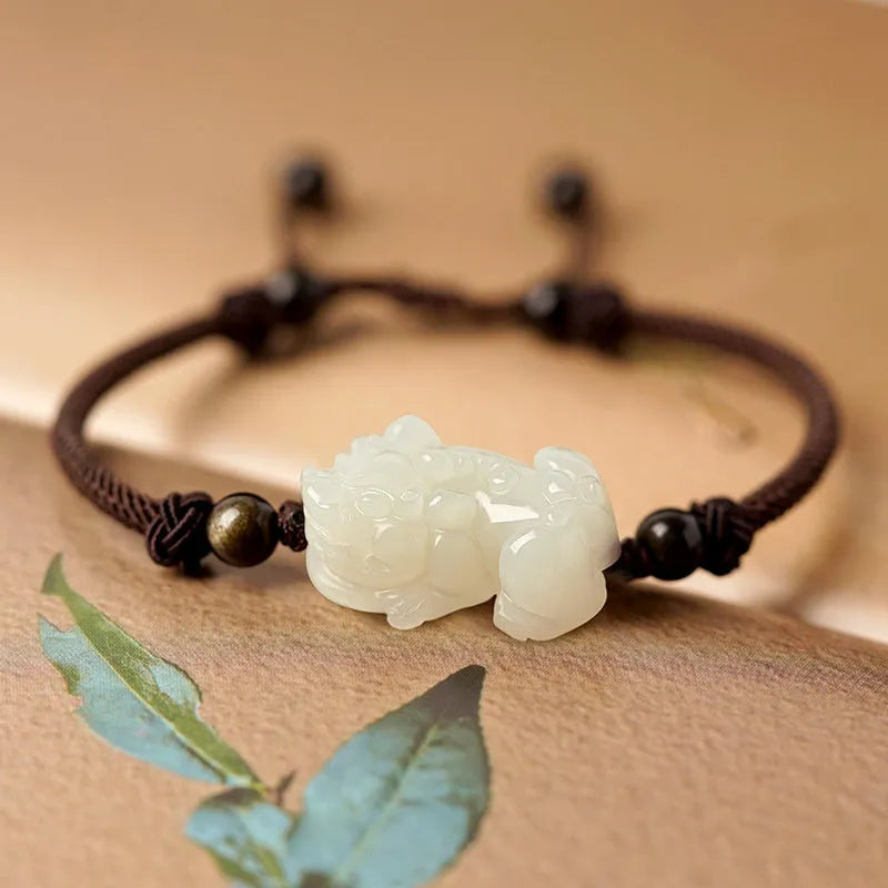 Hetian jade bracelet with braided rope closure in traditional Chinese style