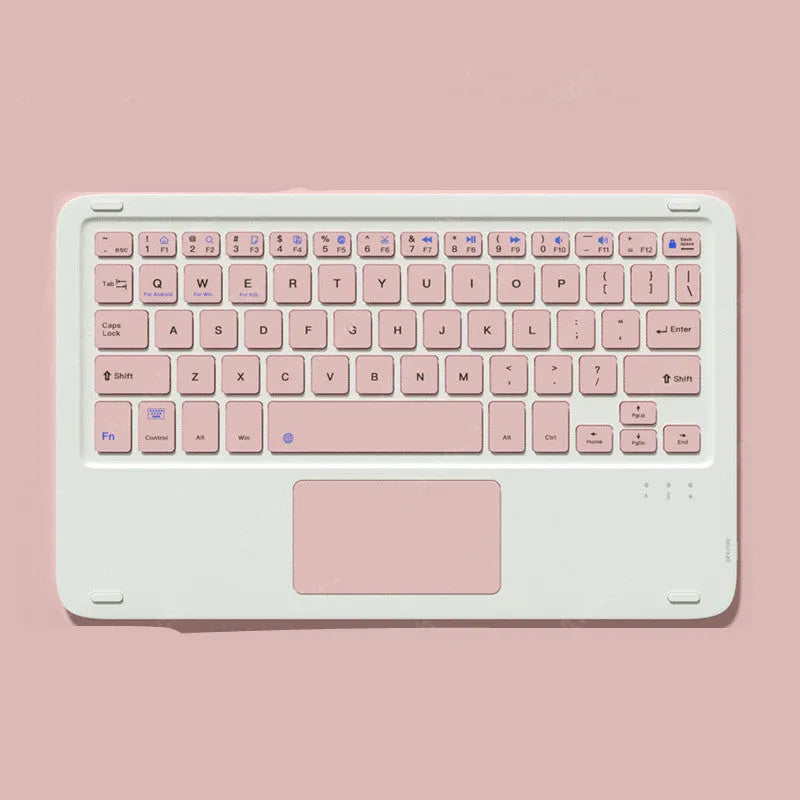 Pink wireless Bluetooth keyboard and matching dual-mode charging mouse on a desk
