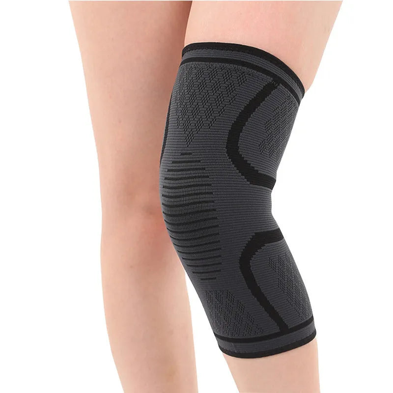 Double corrugated non-slip sports knee pads in various colours on a grey background.