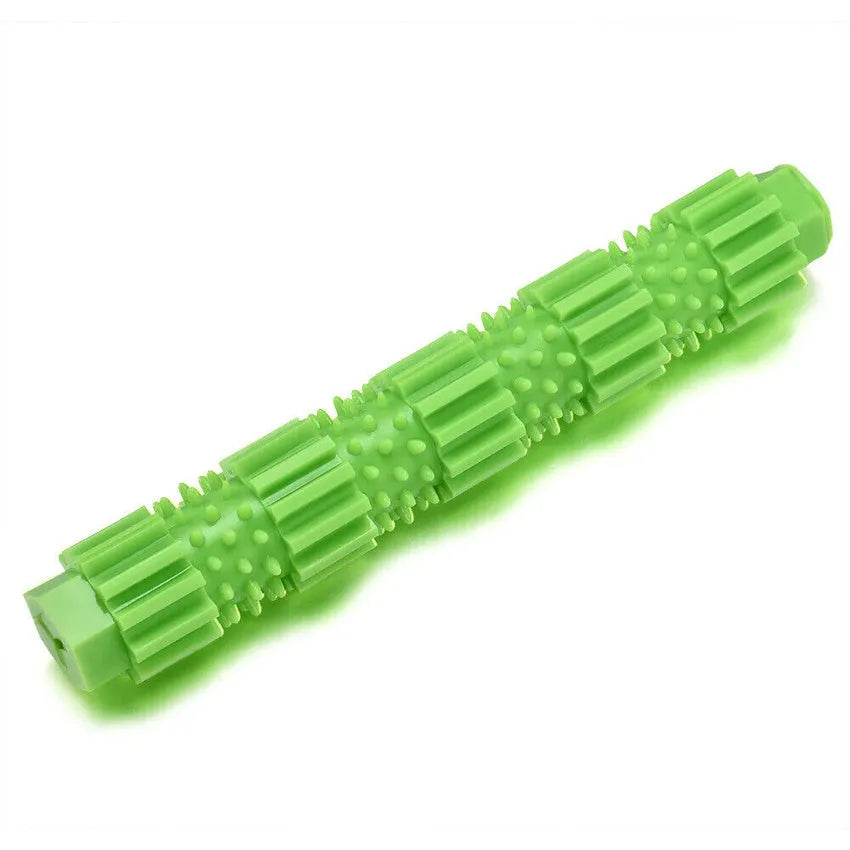 Green and orange rubber dog chew toy with treat dispensing opening and textured teeth cleaning surface