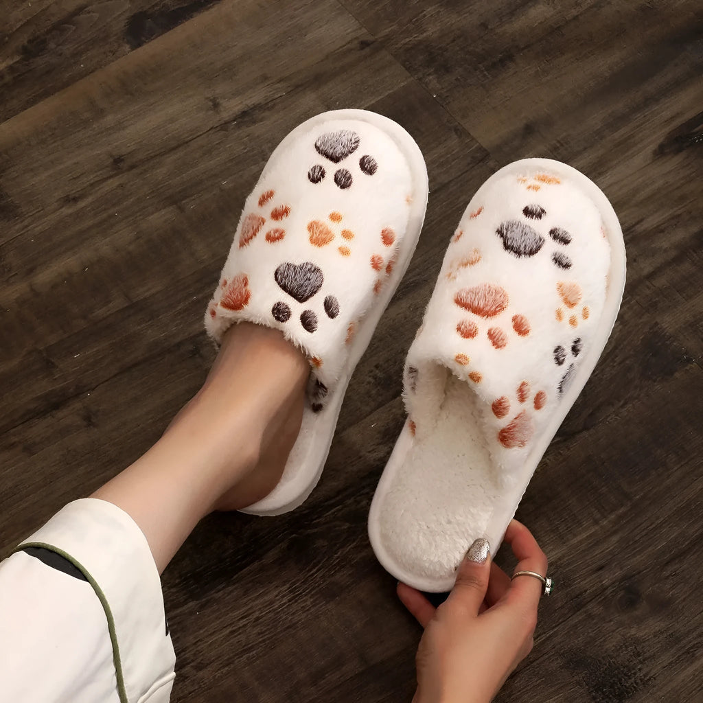Women's cartoon print velvet cotton slippers in white with a toe holder design, shown on a plain background