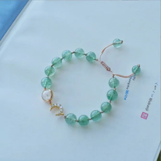 Handmade strawberry quartz crystal bracelet for women showing five natural stone design variations