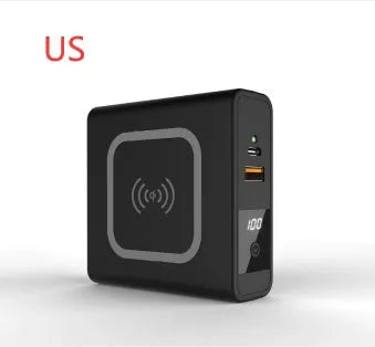 Black and white 10000mAh power bank with wireless charging, a fold-out plug, and international travel adapters.