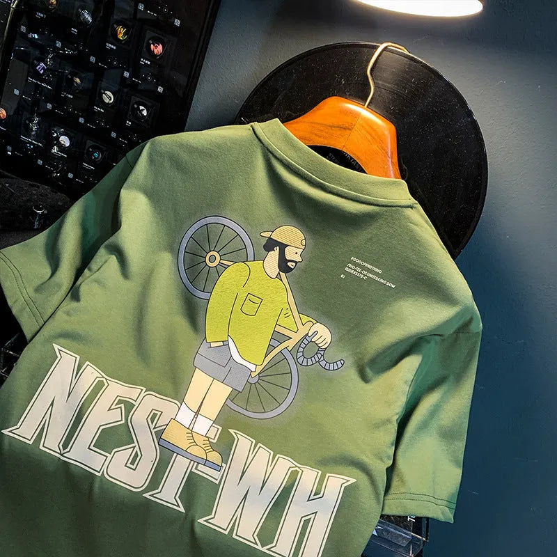Green men's t-shirt with printed literary youth design showing loose fit and short sleeves
