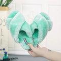 Cross open-toe fur slippers in multiple colours on a patterned non-slip sole.