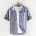 Men's square collar short sleeve linen shirt in raw jute colour on a hanger