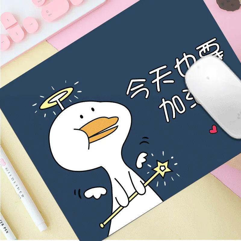 Custom cartoon mouse pad with thickening, showing example artwork on non-slip rubber and cloth base.