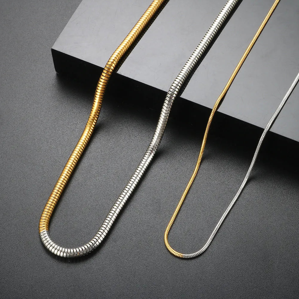 Golden stainless steel snake bone chain necklace with 3mm thickness and geometric line design