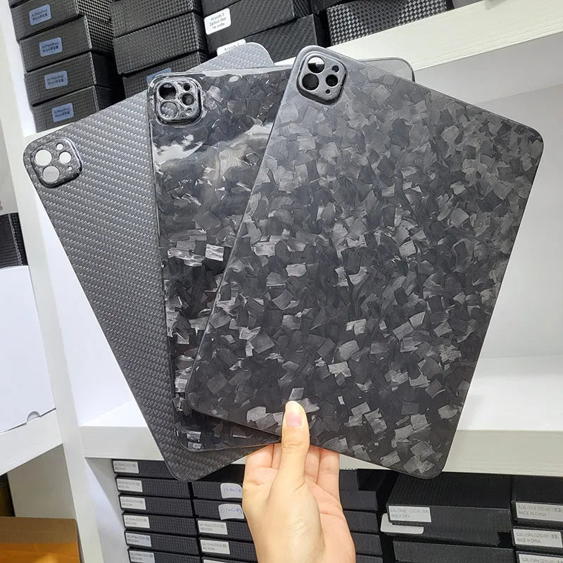 Carbon fibre hard case for Apple iPad Pro 11 with embossed plaid pattern showing three surface finish options