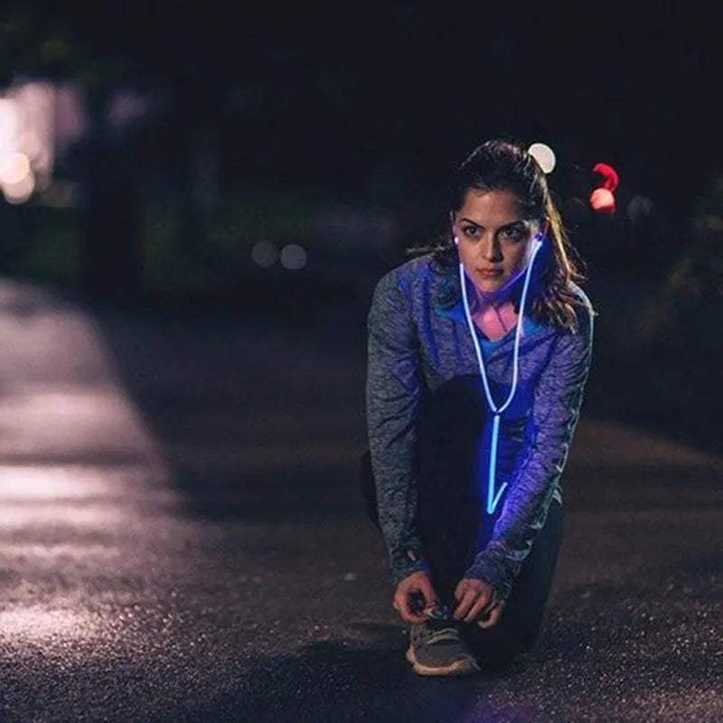 Blue LED light-up earphones with aluminium alloy shells and remote control microphone on cable