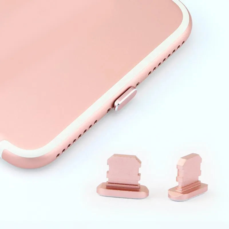 Aluminium alloy charging port dust plug for iPhone in various colours including gold, silver, and rose gold.