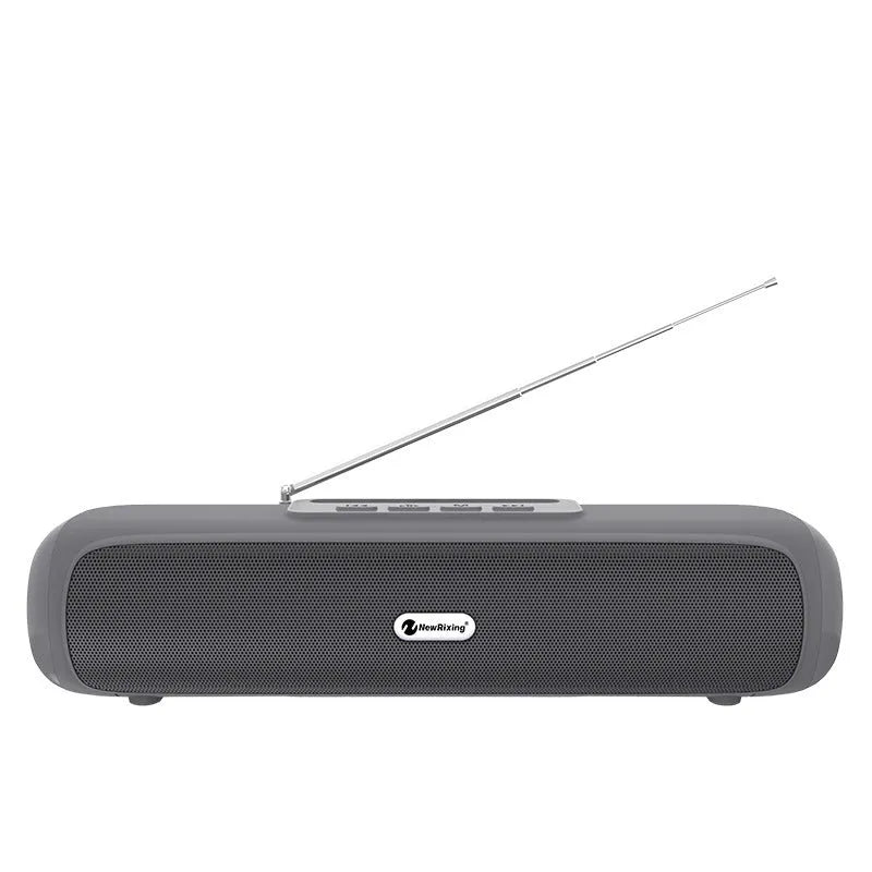 Long strip wireless desktop subwoofer speaker in black, showing Bluetooth and FM radio functions.