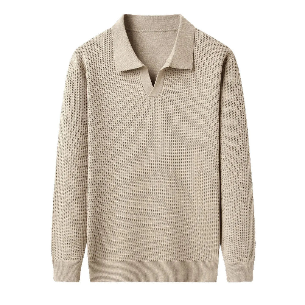 A man's loose-fitting casual pullover jumper in a neutral colour, shown on a model.