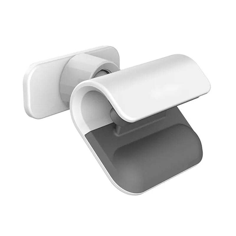 Black universal gravity car phone holder showing 360-degree rotation, mounted on a car air vent.