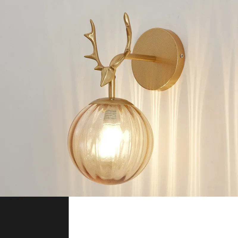Minimalist round Nordic style glass wall lamp on a white wall