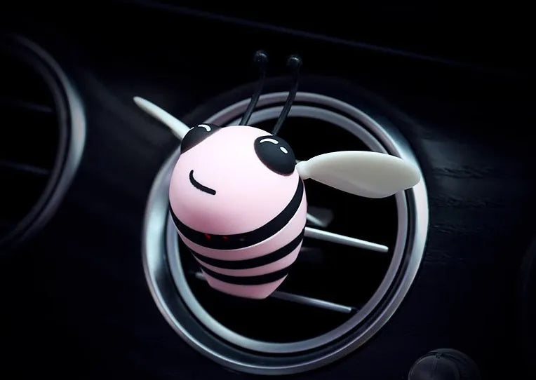 Little bee shaped car vent clip in yellow with metal alloy perfume seat and solid fragrance tablet