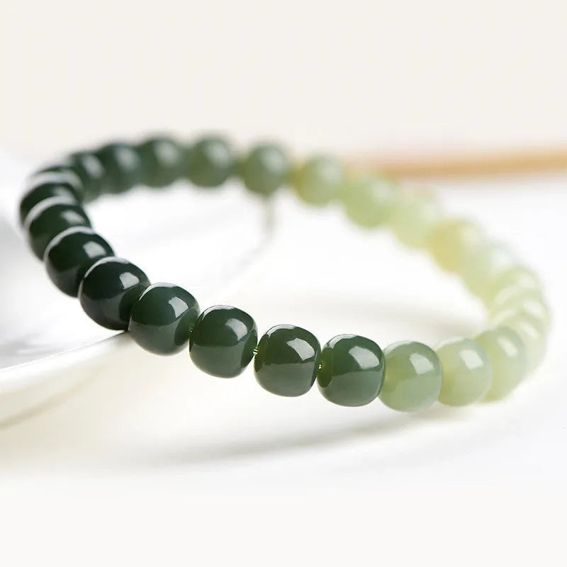 Natural Hetian jade bracelet with sunny water gradient colour on wrist