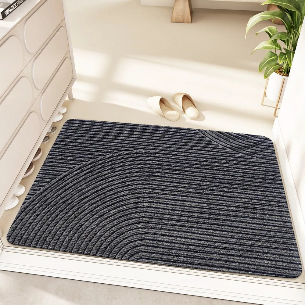 Diatom oil entrance mat with alien shape design in blue colour, measuring 60 by 90 centimetres