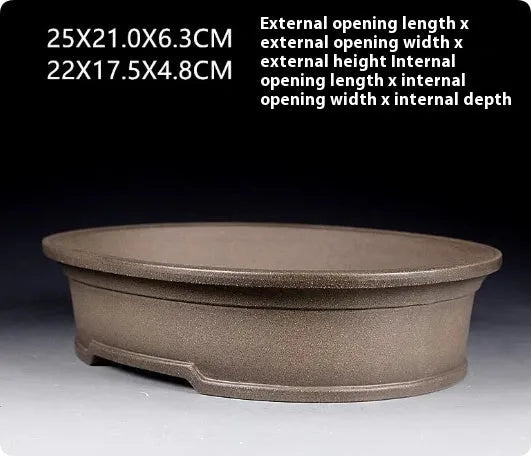 Handmade antique oval bonsai flower pot in purple sand clay, showing dimensions 25cm by 21cm.