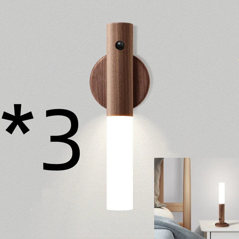 Smart sensor LED desk lamp in wood and acrylic glass on a desk.