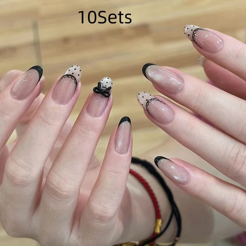 Assorted fake nail sets for girls in various colours and patterns.