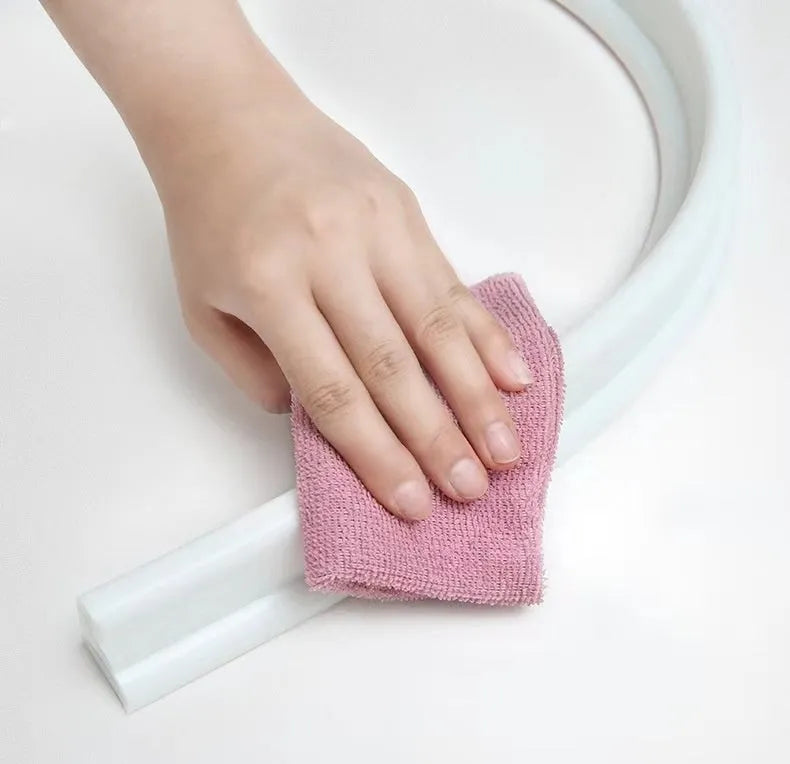 Flexible TPE bathroom water blocking strip in black, white, or grey colours for shower room wet-dry separation
