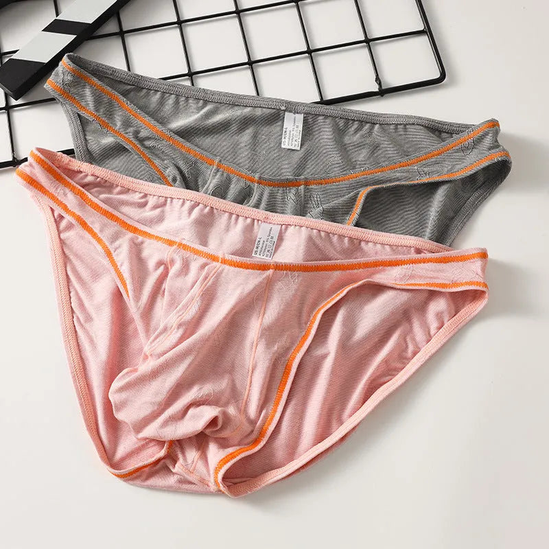 Men's modal butt-lift underwear in dark gray, knitted fabric, shown flat.