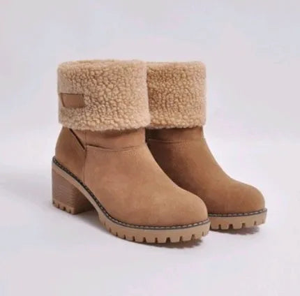 Women's mid-tube suede snow boot in black with a thick heel and round toe.