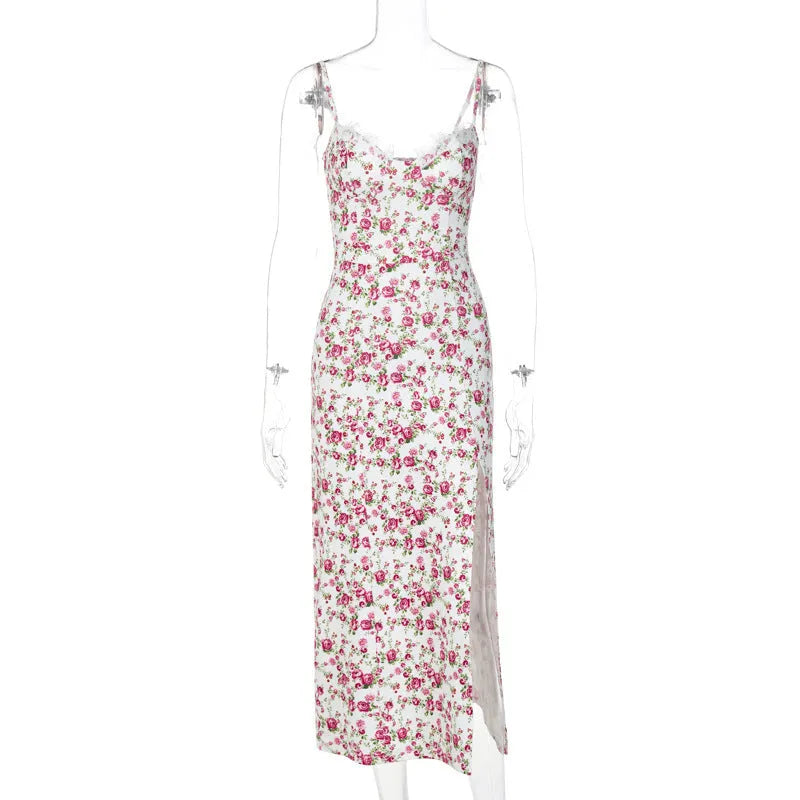 Women's blue lace flower print long dress with black suspender straps and a thigh-high side slit.