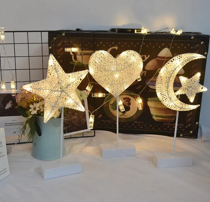 Rattan star-shaped LED lamp with copper wire frame measuring 23x40cm