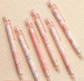 Peach plastic automatic pencil press 0.5mm lead with refills, no sharpening required