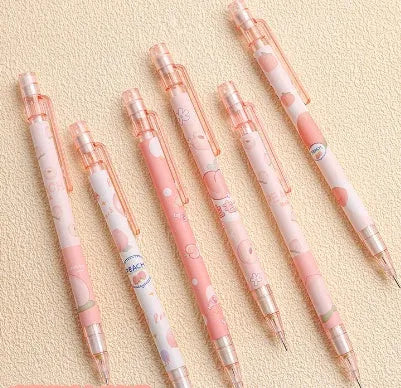 Peach plastic automatic pencil press 0.5mm lead with refills, no sharpening required
