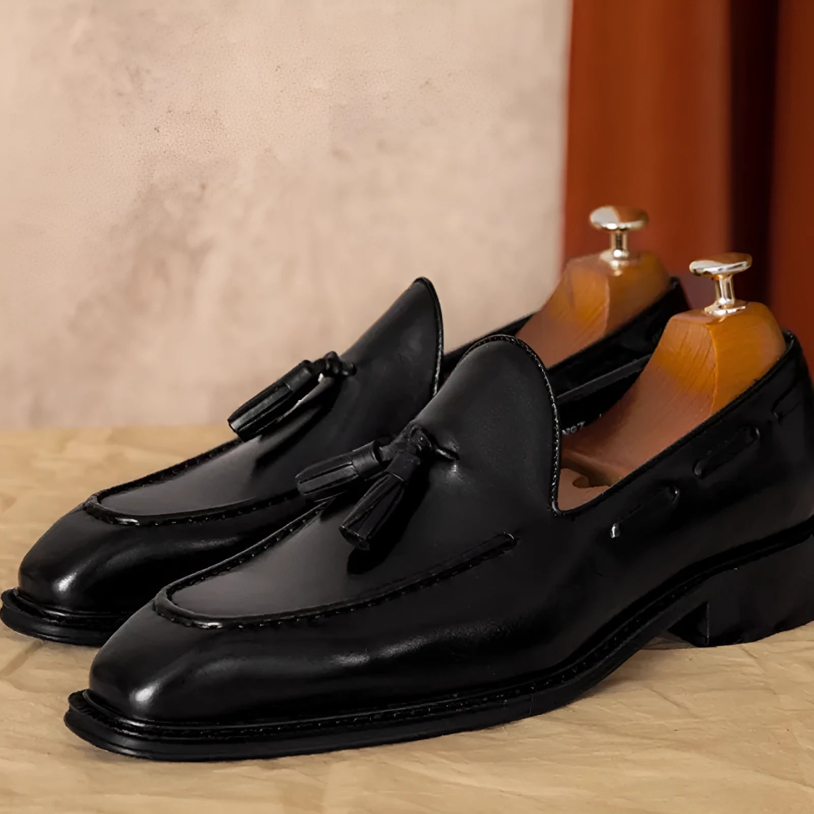 Men's black genuine leather loafers with fringed design and rubber soles
