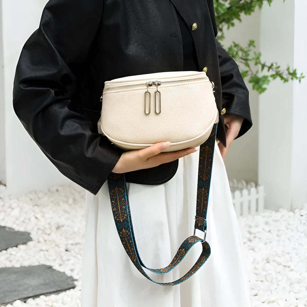 Women's soft PU messenger bag in saddle shape with cross-body strap