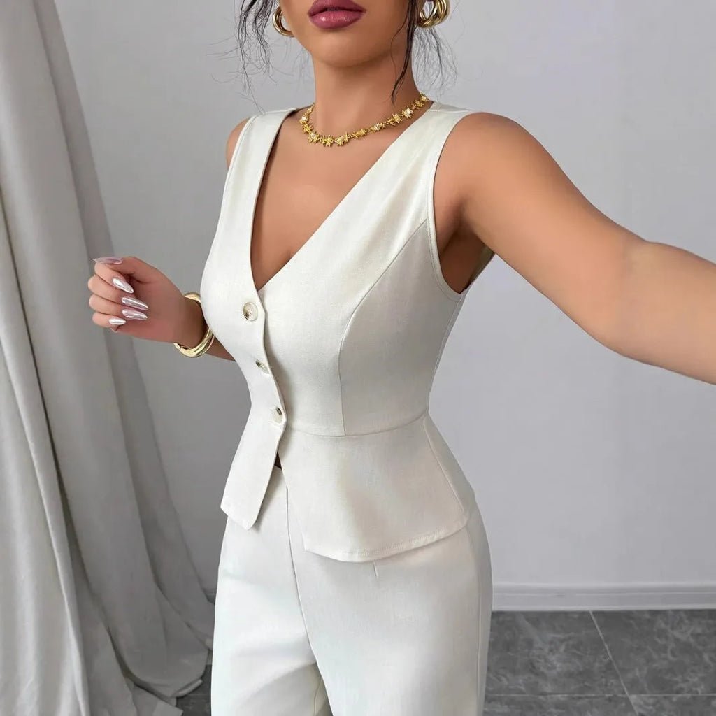Women's solid colour sleeveless vest and high-waist trouser two-piece set in a casual style.
