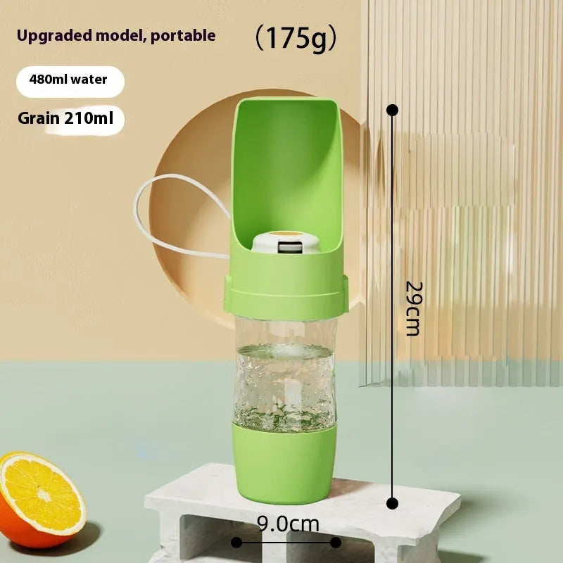 Green 2-in-1 travel dog water bottle and feeder with lanyard, showing folded size.