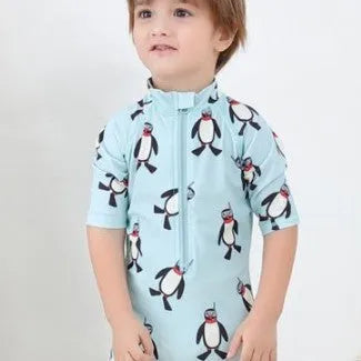 Boys penguin design swimwear set with long sleeves and matching swimming cap